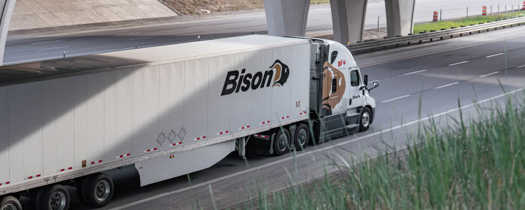 A Bison Transport truck on the highway.
