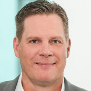 Headshot of Justin Newell, CEO, INFORM North America