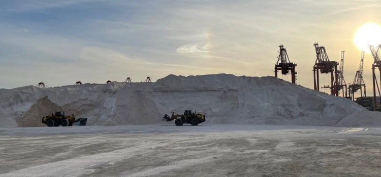 Image of piles of salt that reach 40-50 feet high.