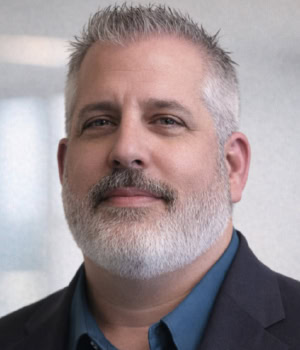 Headshot of Adam Baltzell, Head of Brokerage Services, AVI.