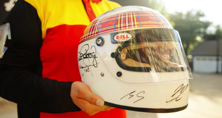A helmet signed by all 20 living Formula 1 world champions.
