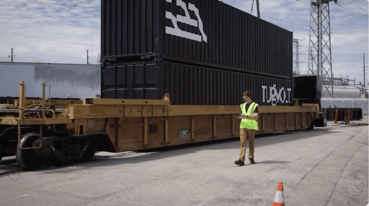 Tugvolt Uber Freight, Tesla, Watco, and Intramotev Explore EV Logistics