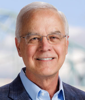 Headshot of Denis Reilly, President & CEO, Kenco.