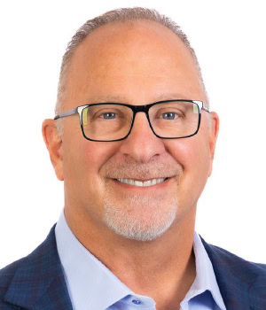 Headshot of Doug Waggoner, CEO of Echo Global Logistics.