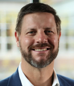 Headshot of John R. Ness, CEO, ODW Logistics.