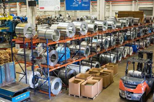 busy warehouse for supply chain, logistics and distribution