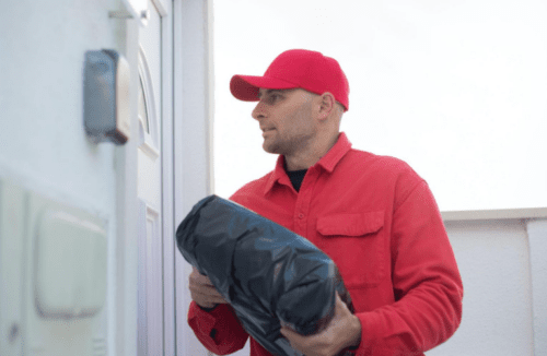 delivery man holding package