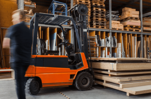 forklift carrying wood