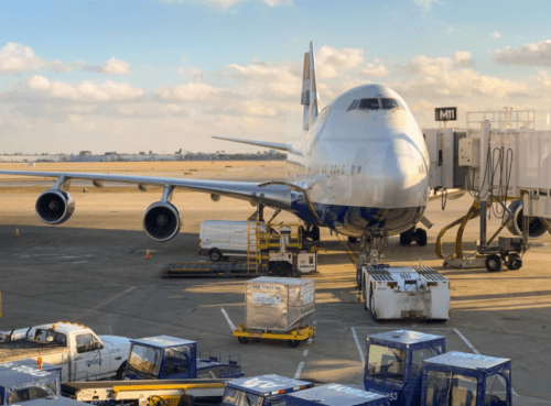 large jet plane parked at gate